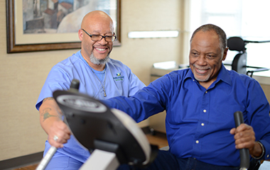Man exercising with supervision