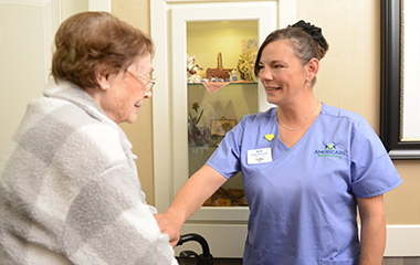 Nurse talking to resident